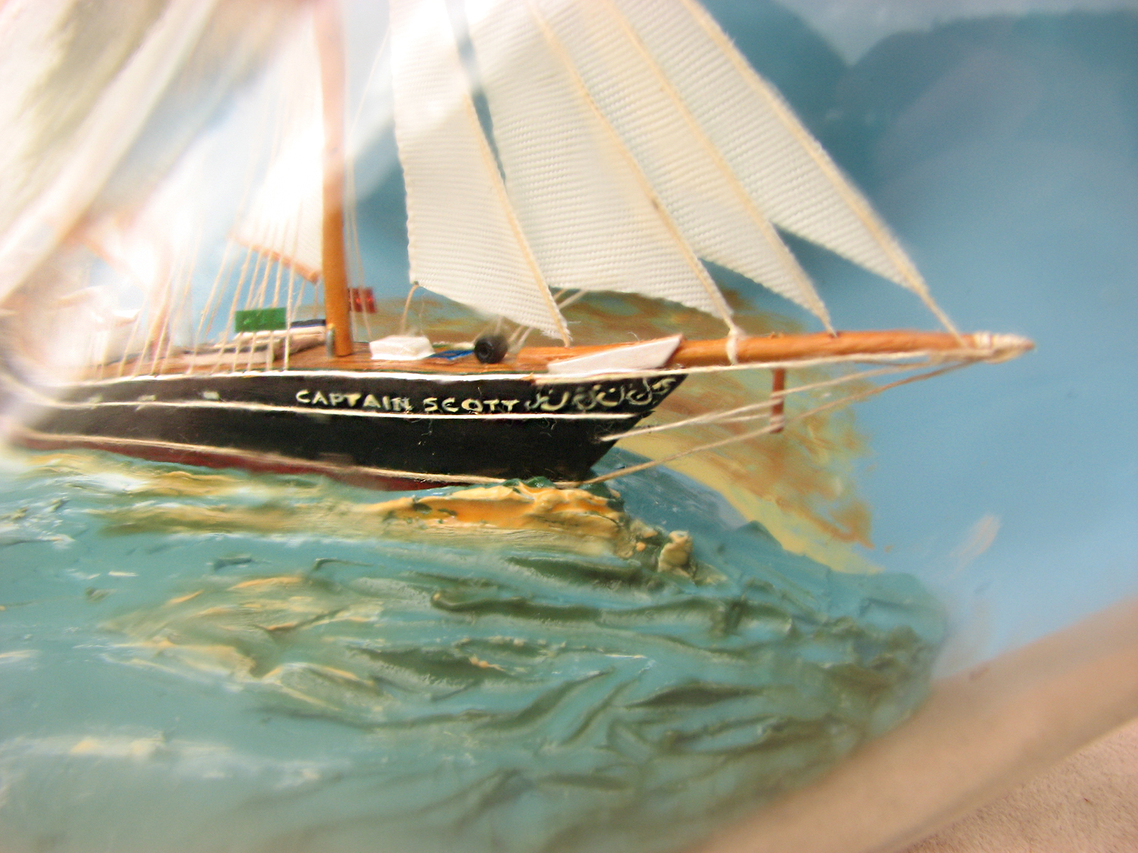 Model of the Captain Scott adventure schooner in a 1970's Haig whisky bottle